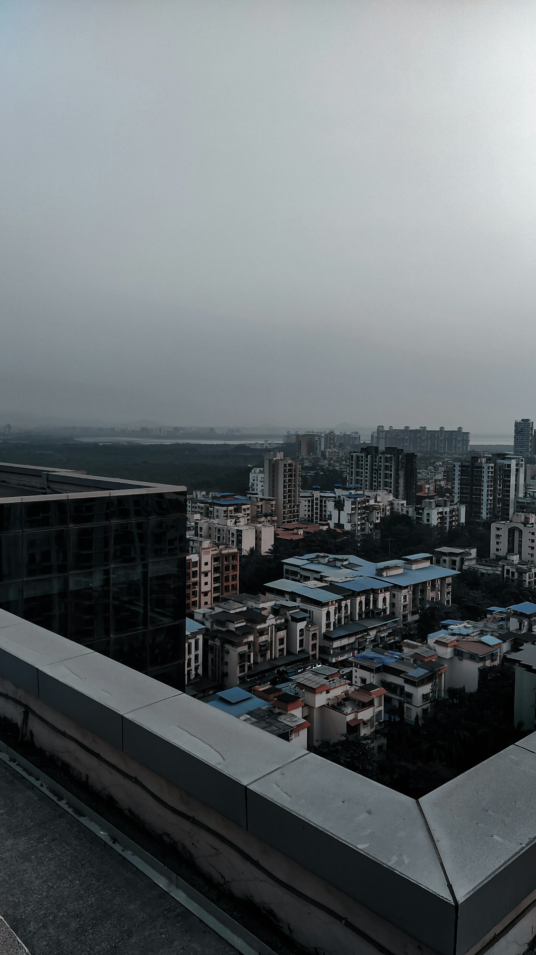 Kharghar vs Taloja Property Investment 2026 - Navi Mumbai residential real estate comparison